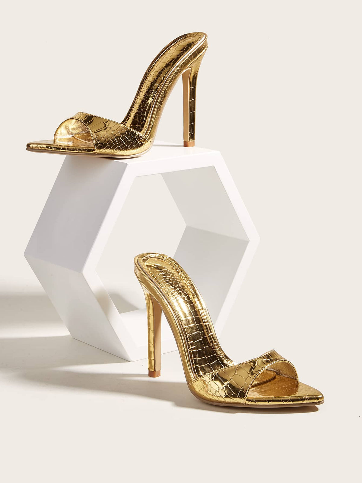 Women's pointed toe high heel sandals featuring a textured satin upper, slim stiletto heel, and slip-on slingback strap.
