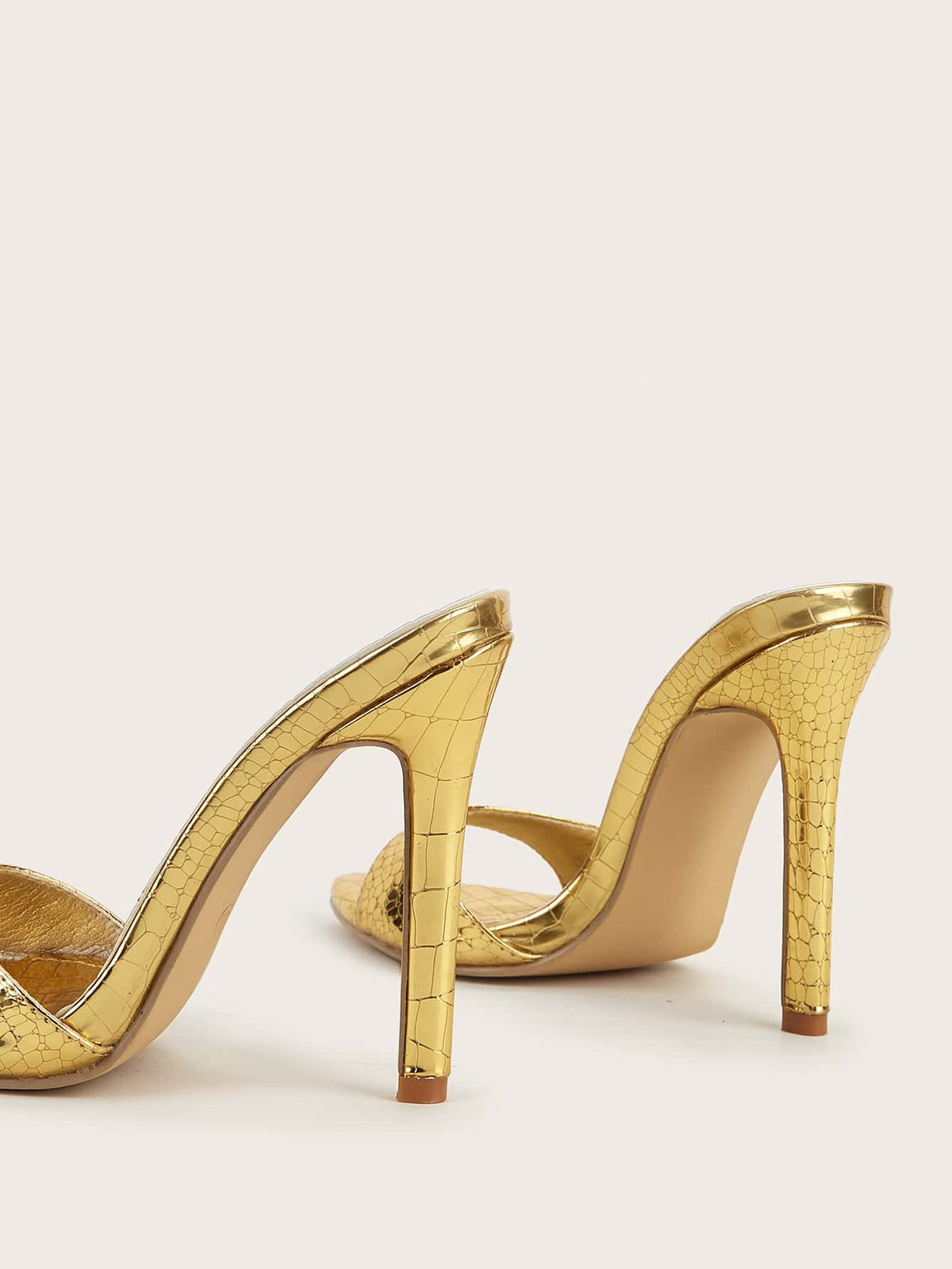 Women's pointed toe high heel sandals featuring a textured satin upper, slim stiletto heel, and slip-on slingback strap.