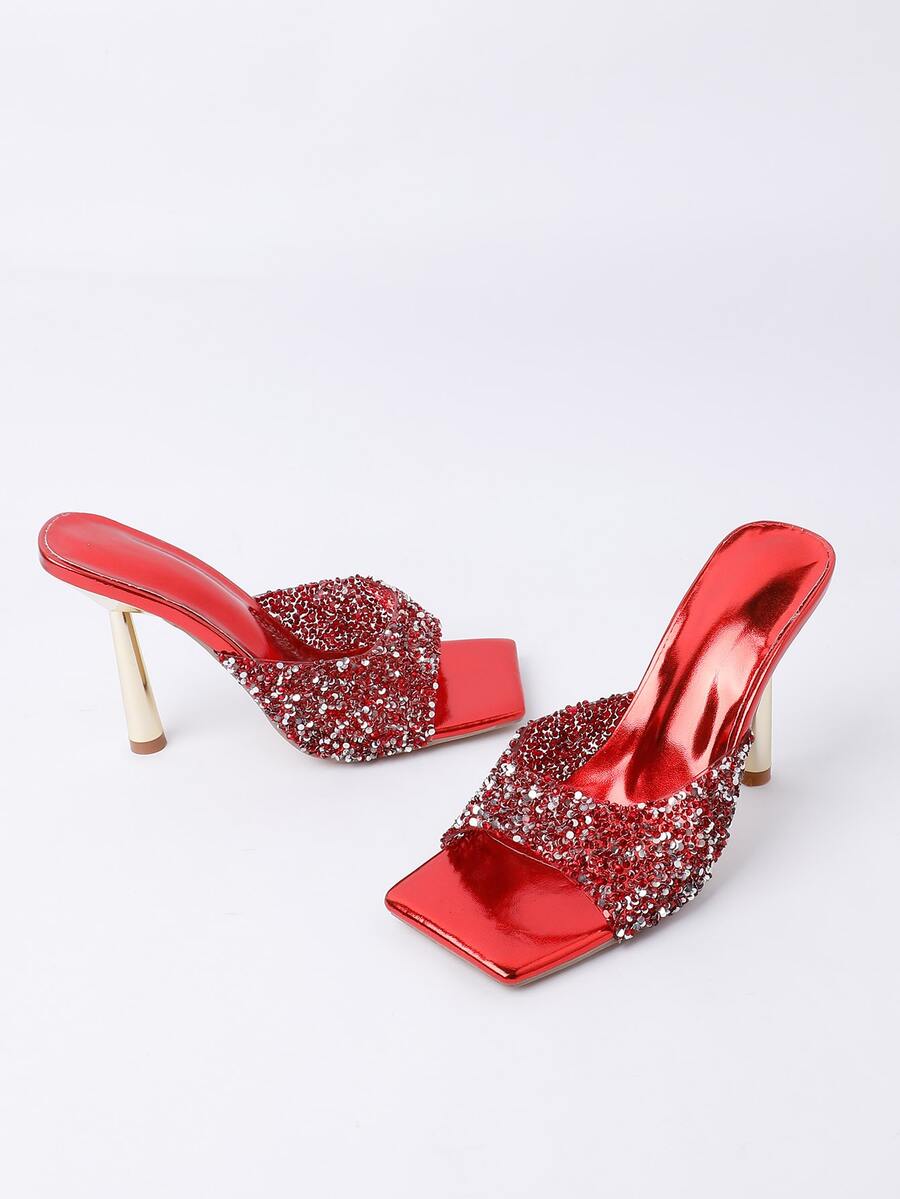 Women's slip-on high heel sandals featuring sparkling rhinestones, an open square toe, and a stiletto heel.