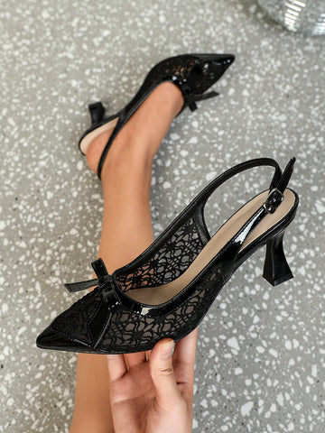 Pointed toe stiletto high heels featuring white mesh lace upper, bowknot accent, and slingback buckle strap.