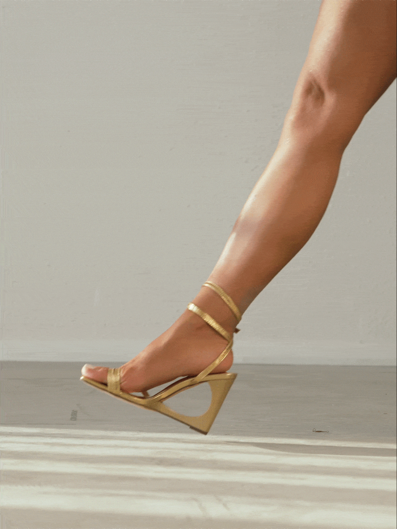 Women's open-toe platform wedge shoes featuring metallic decor and crisscross ankle strap with buckle closure.