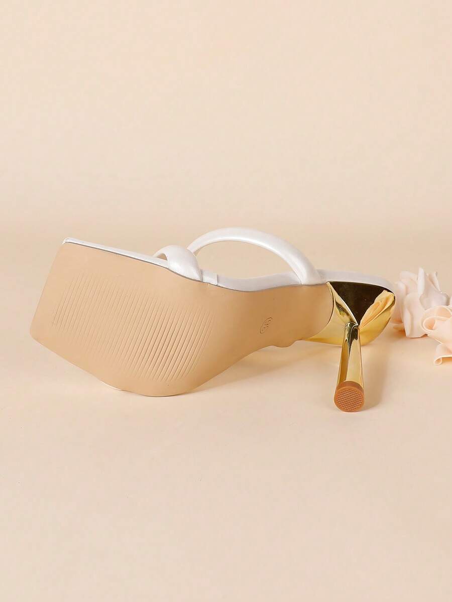 Square toe high heel sandals featuring sparkling rhinestone strap details and stiletto heels in PU leather.