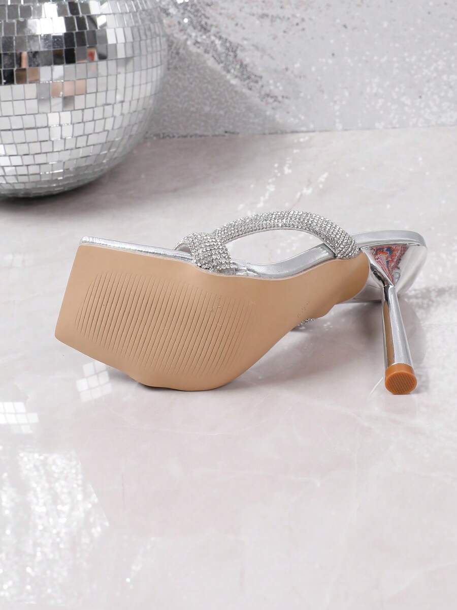 Square toe high heel sandals featuring sparkling rhinestone strap details and stiletto heels in PU leather.