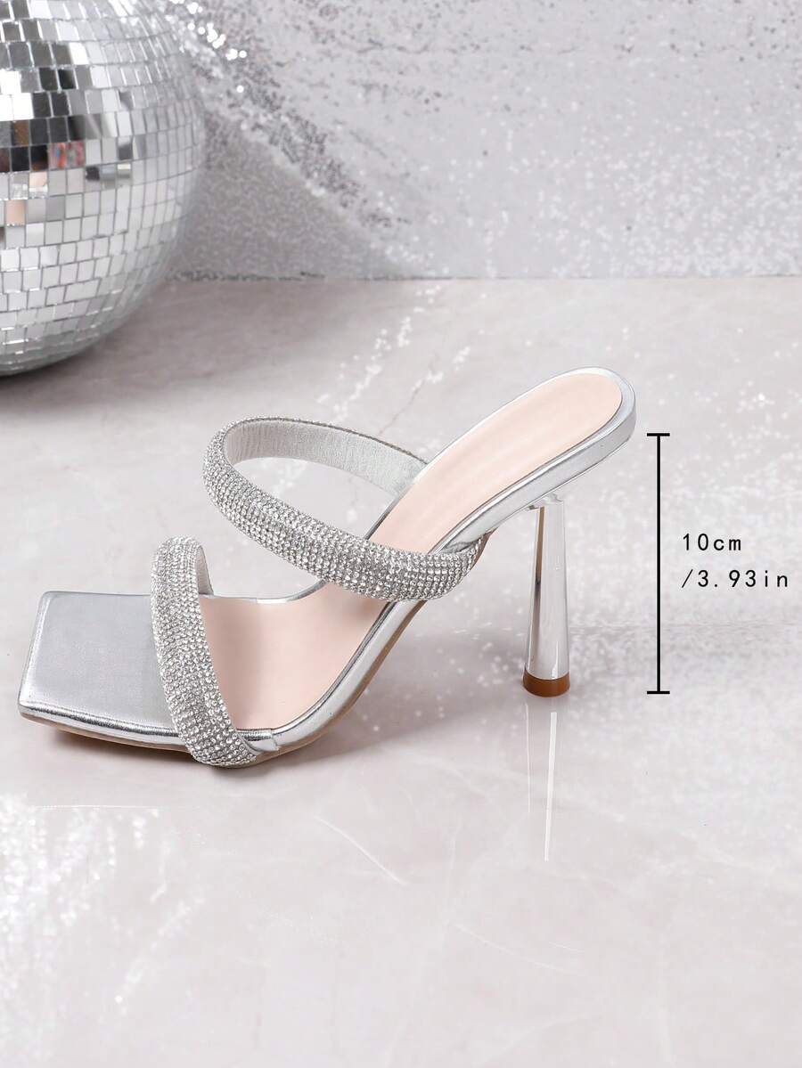 Square toe high heel sandals featuring sparkling rhinestone strap details and stiletto heels in PU leather.
