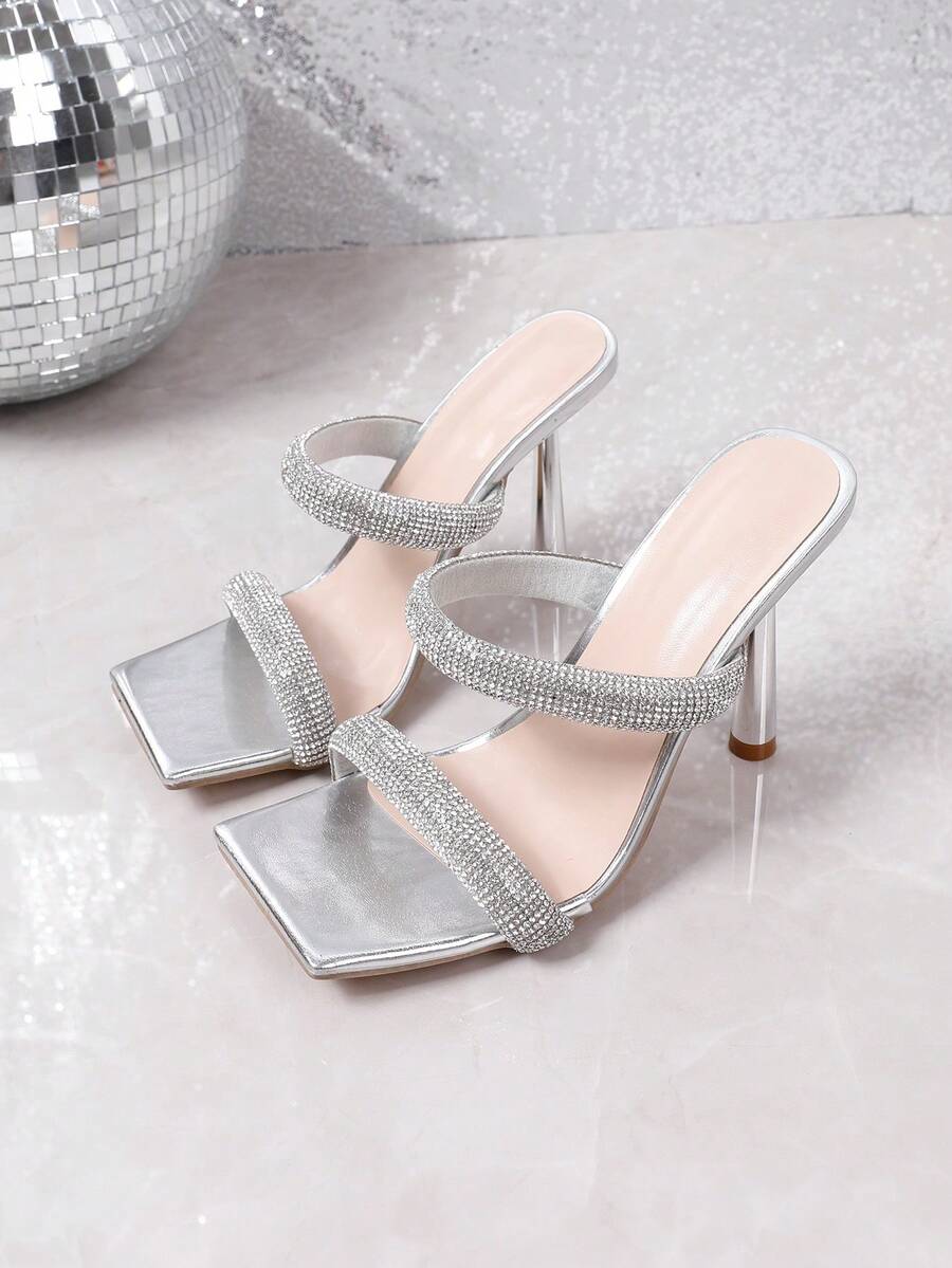 Square toe high heel sandals featuring sparkling rhinestone strap details and stiletto heels in PU leather.