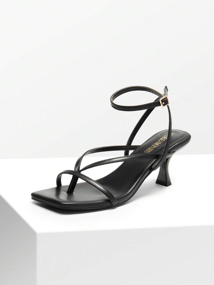 Pair of women's minimalist square toe kitten heeled thong sandals featuring slim ankle straps with buckle closure and sleek low heels.