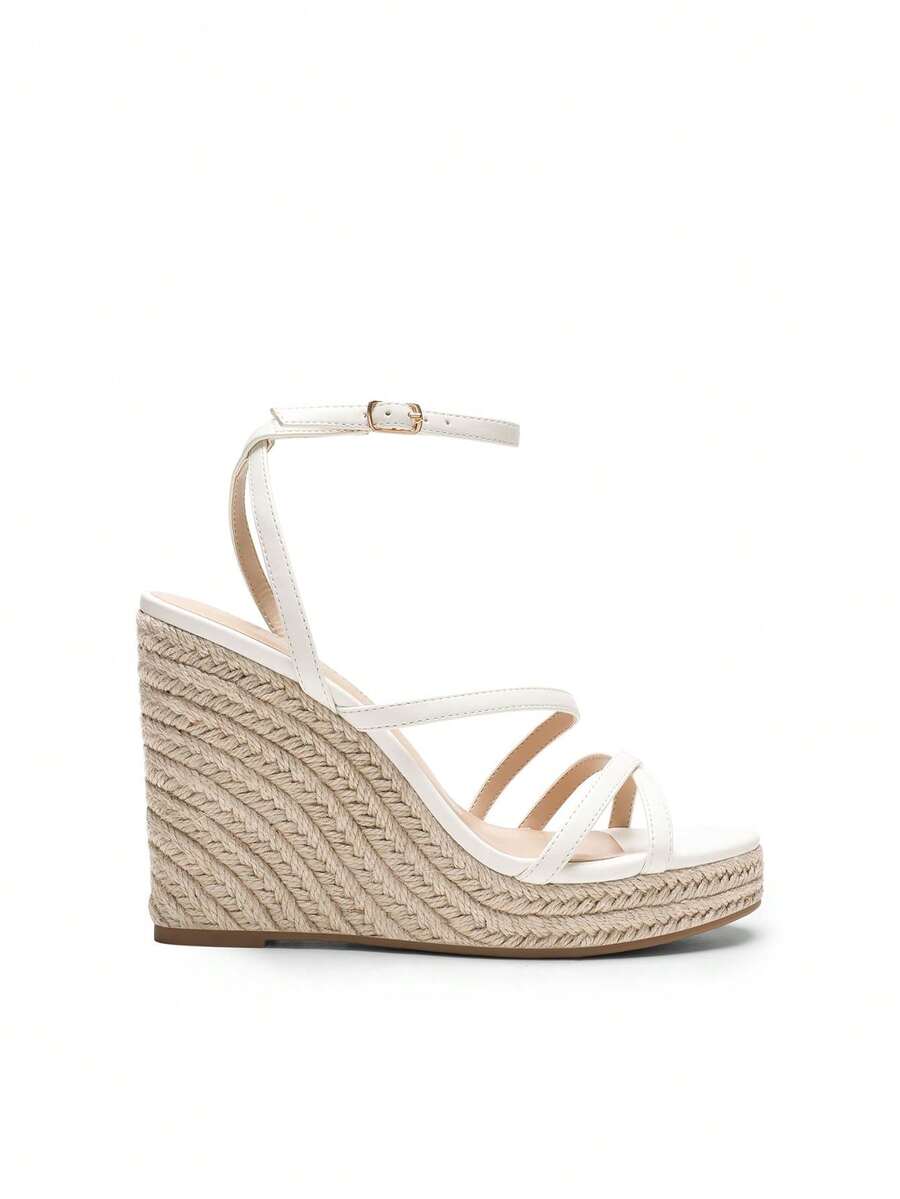 Women's strappy espadrille platform wedge sandals featuring an open toe design and adjustable ankle buckle strap