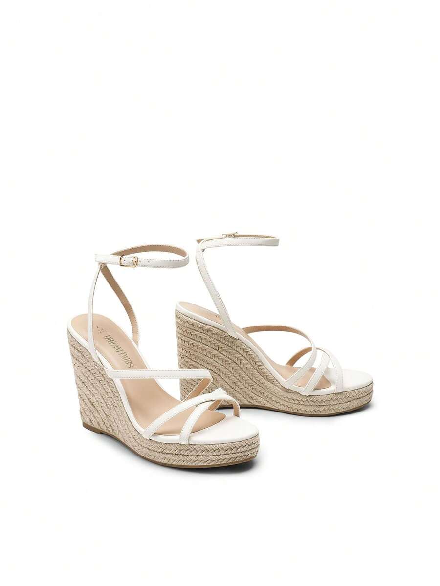 Women's strappy espadrille platform wedge sandals featuring an open toe design and adjustable ankle buckle strap