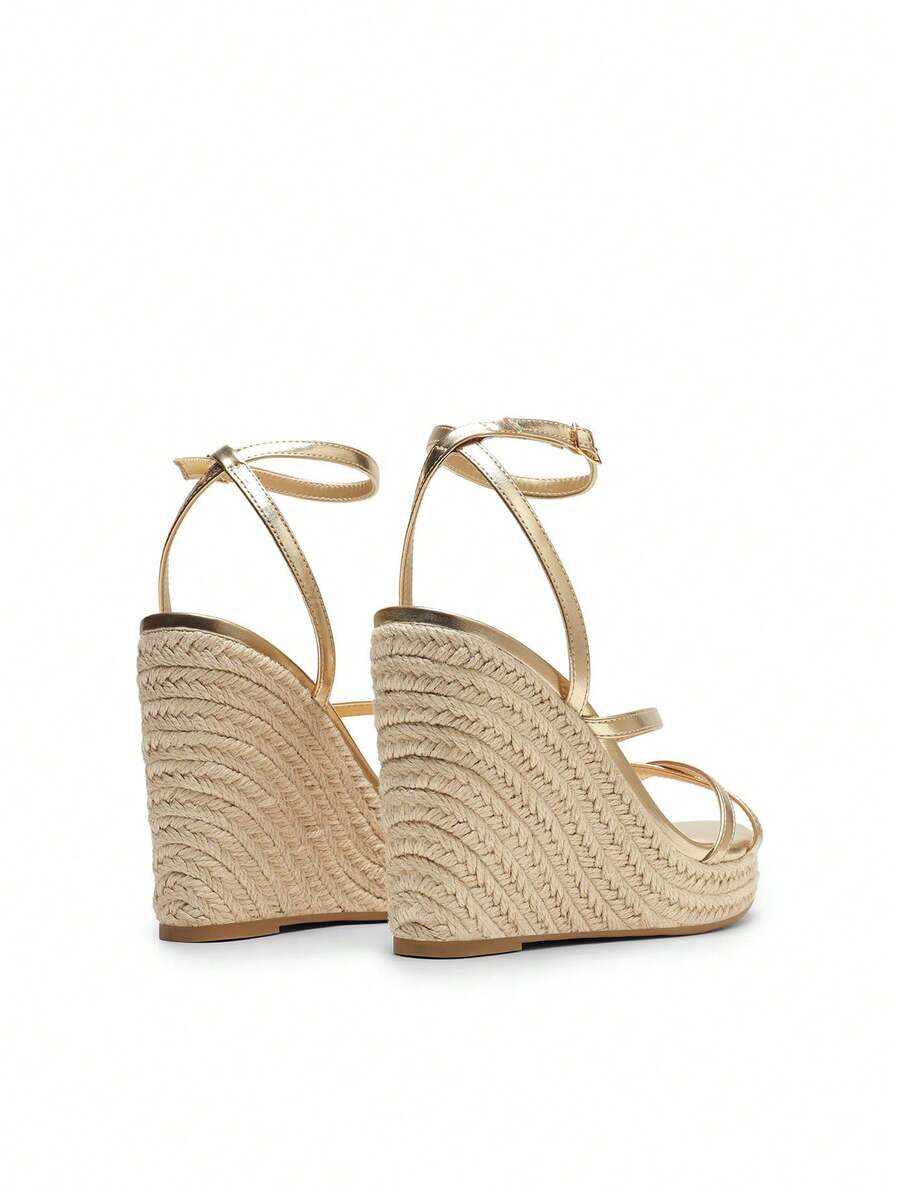 Women's strappy espadrille platform wedge sandals featuring an open toe design and adjustable ankle buckle strap