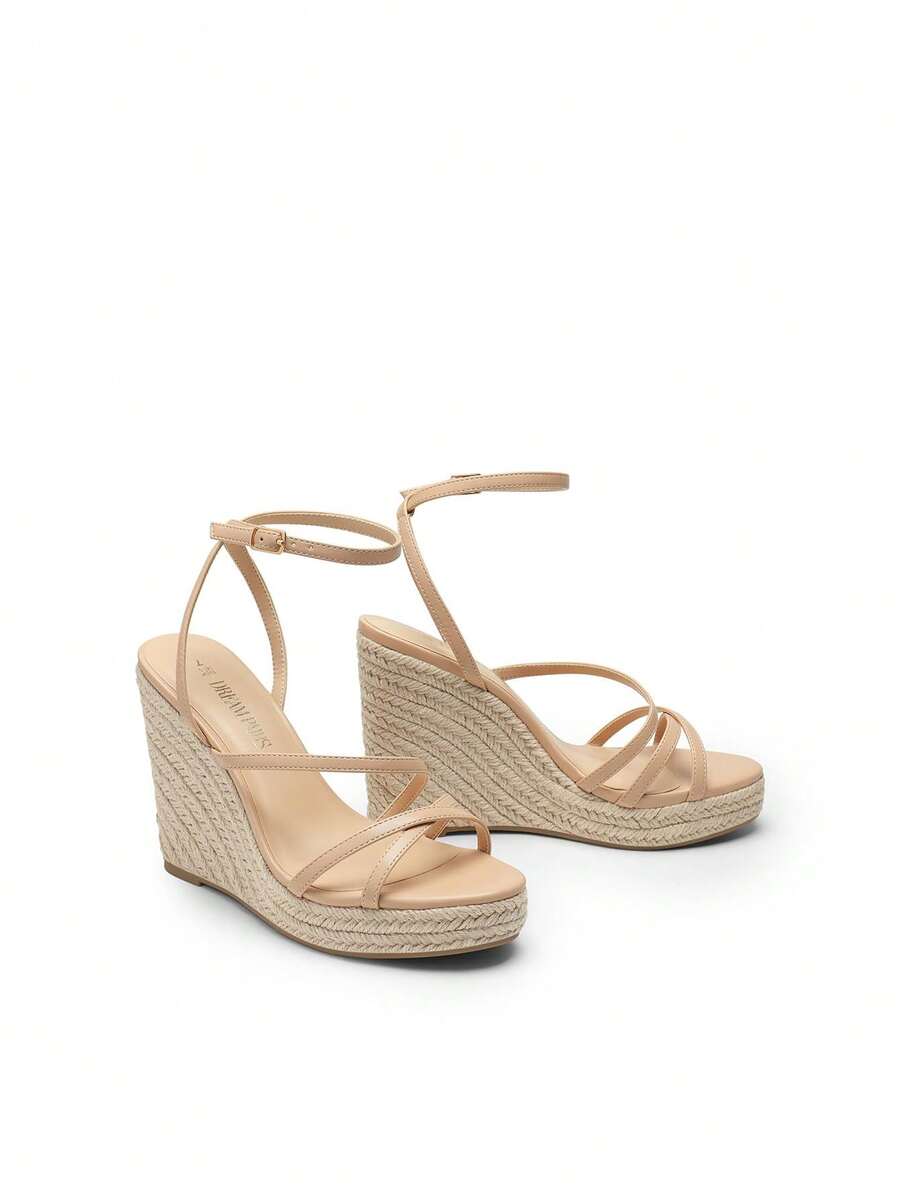 Women's strappy espadrille platform wedge sandals featuring an open toe design and adjustable ankle buckle strap