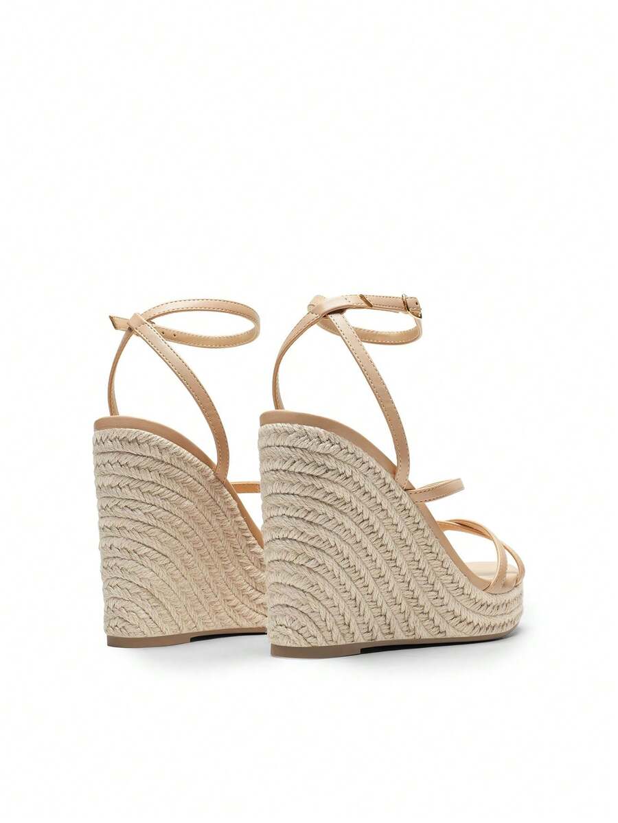 Women's strappy espadrille platform wedge sandals featuring an open toe design and adjustable ankle buckle strap