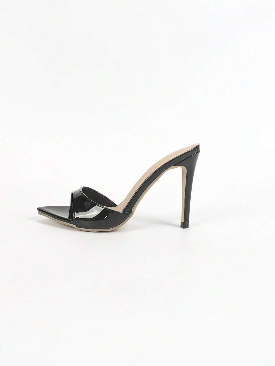 Women's open toe stiletto heel slip-on mule sandals with glossy patent leather finish and hollow-out detailing.