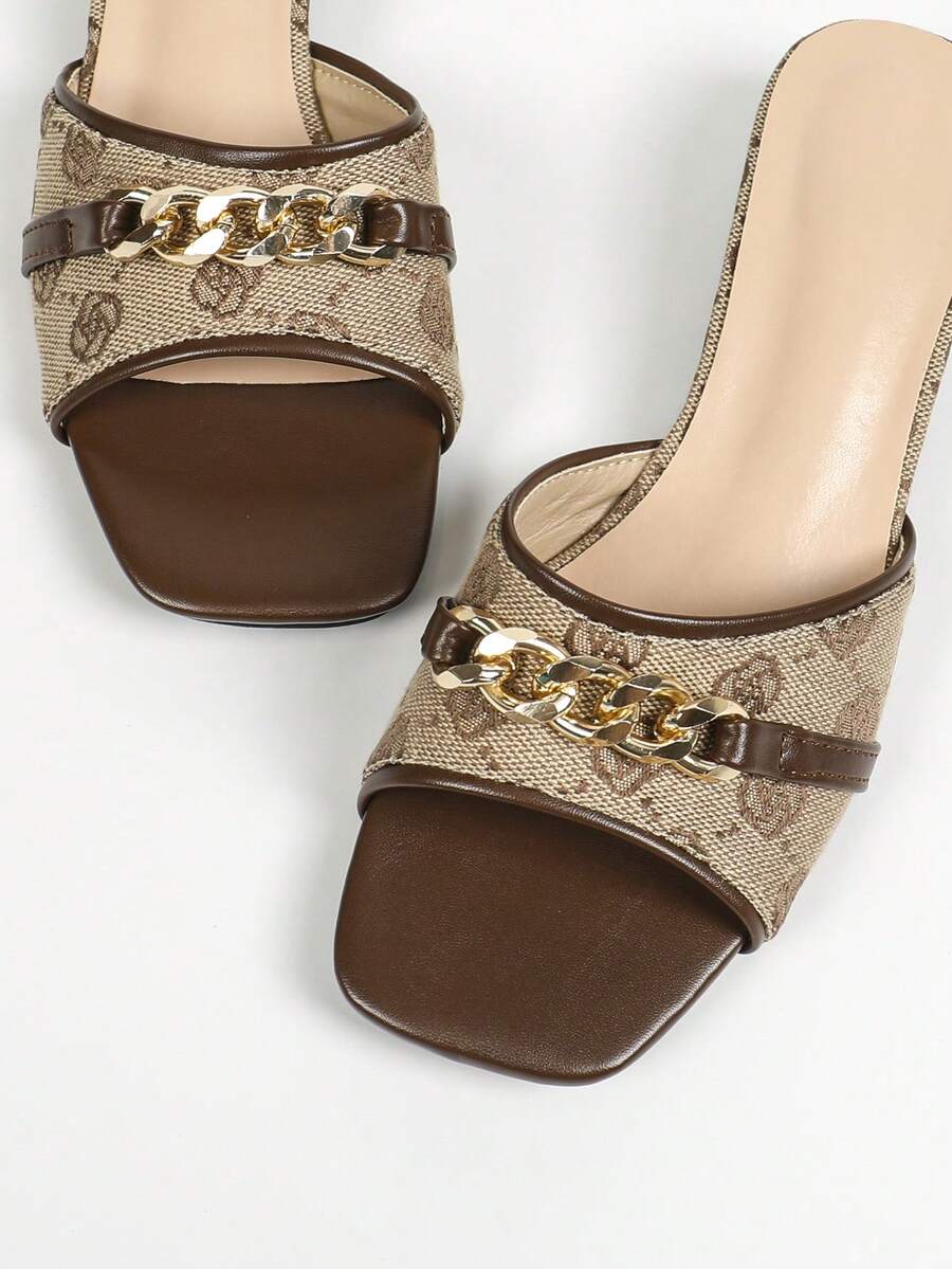Women's multicolor square toe chunky heel sandals with bohemian textured pattern, canvas upper, and slip-on design.