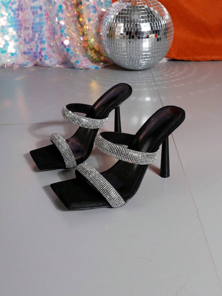 Square toe high heel sandals featuring sparkling rhinestone strap details and stiletto heels in PU leather.