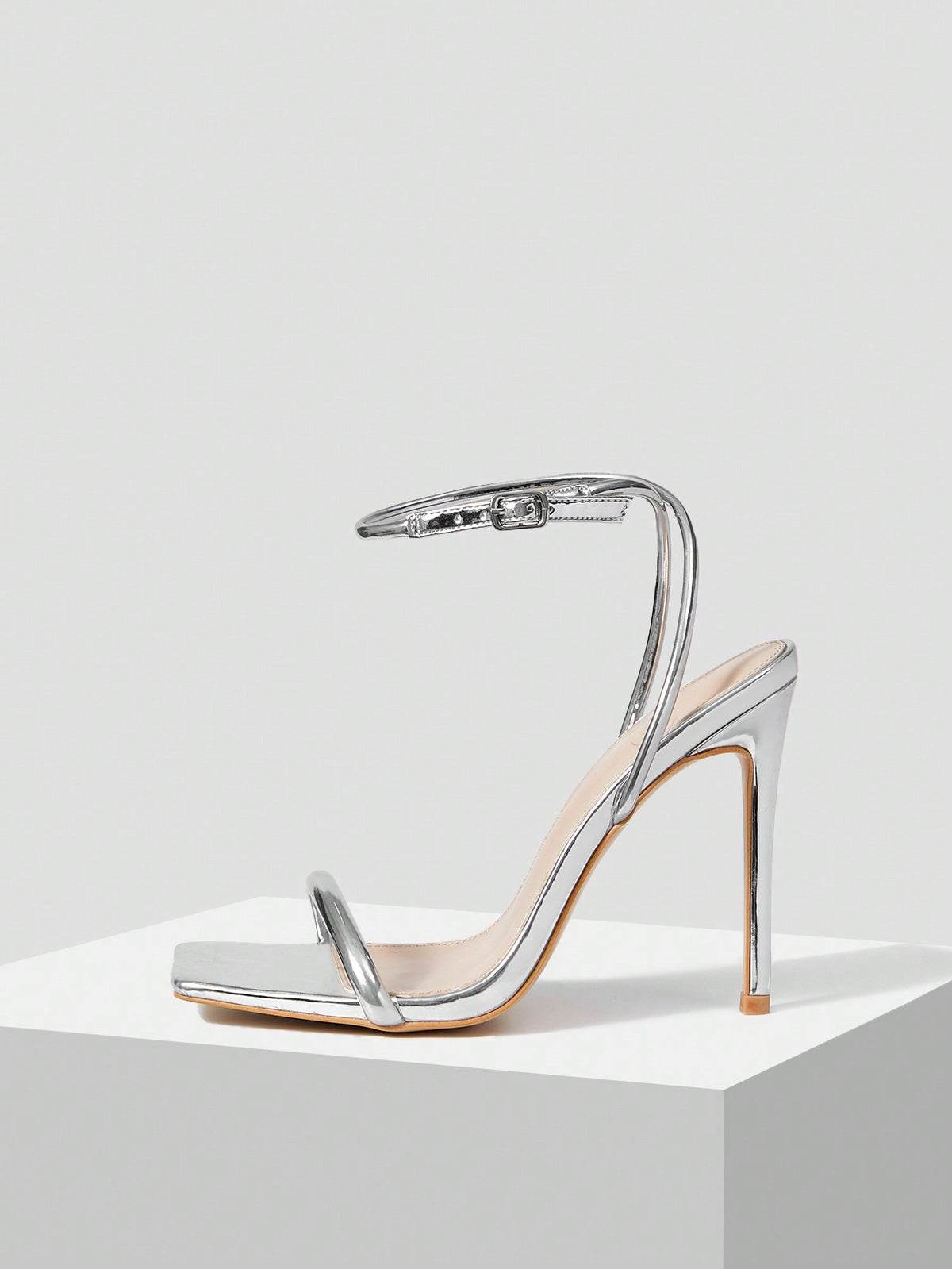 Women's open toe high heel slingback sandals featuring a sleek stiletto heel and adjustable ankle strap buckle closure.