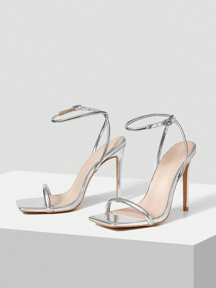 Women's open toe high heel slingback sandals featuring a sleek stiletto heel and adjustable ankle strap buckle closure.