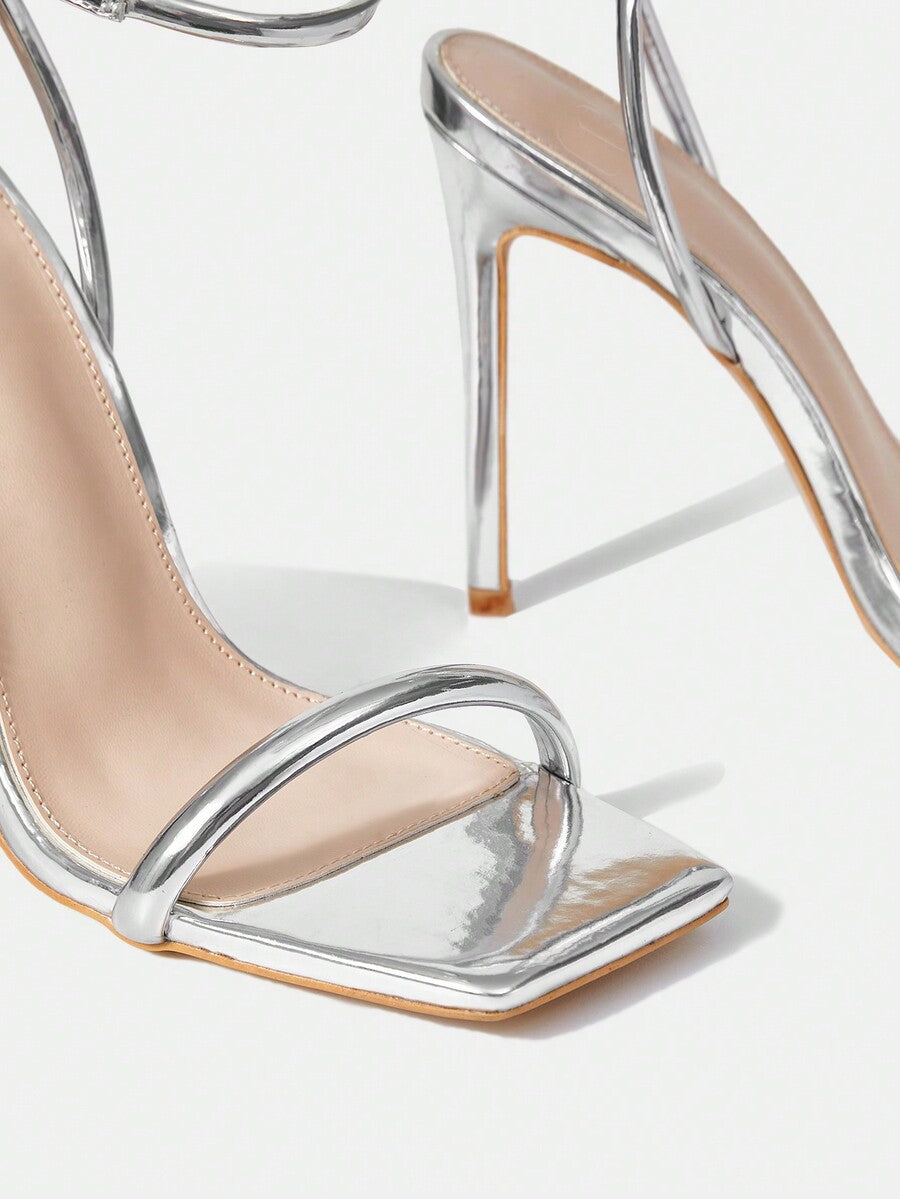 Women's open toe high heel slingback sandals featuring a sleek stiletto heel and adjustable ankle strap buckle closure.