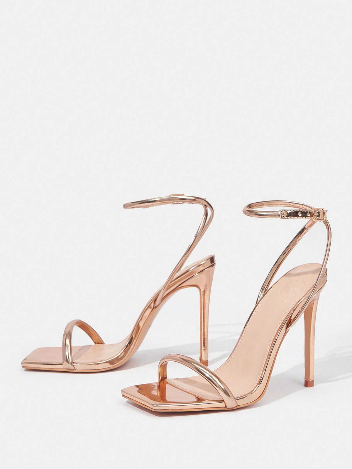Women's open toe high heel slingback sandals featuring a sleek stiletto heel and adjustable ankle strap buckle closure.