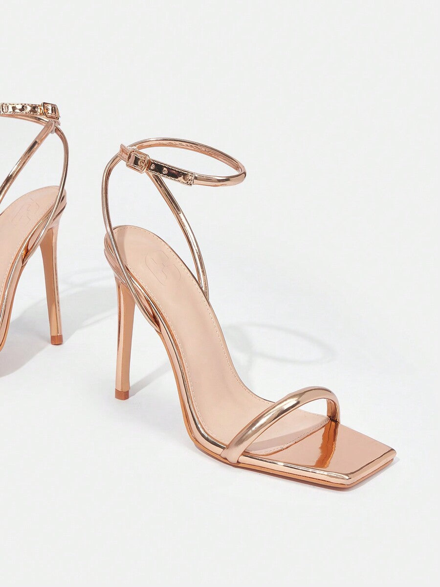 Women's open toe high heel slingback sandals featuring a sleek stiletto heel and adjustable ankle strap buckle closure.