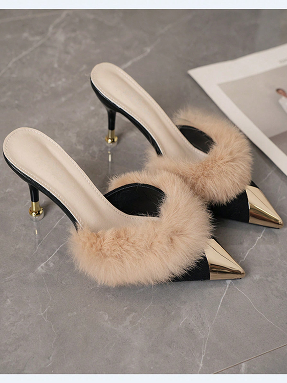 Burgundy pointed toe stiletto heel mules featuring fuzzy faux fur trim and a sleek slip-on design.