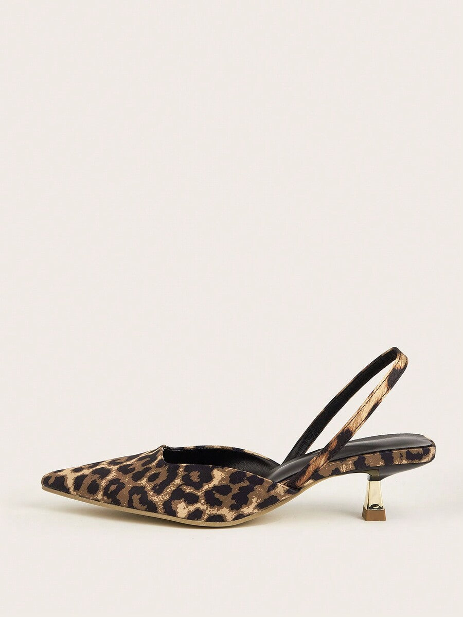 Women's pointed toe kitten heel pumps with leopard print suedette finish and slingback back strap.