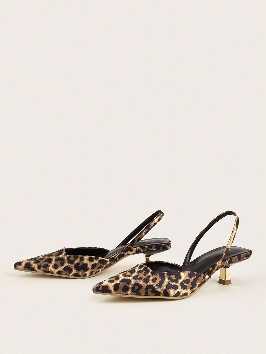 Women's pointed toe kitten heel pumps with leopard print suedette finish and slingback back strap.
