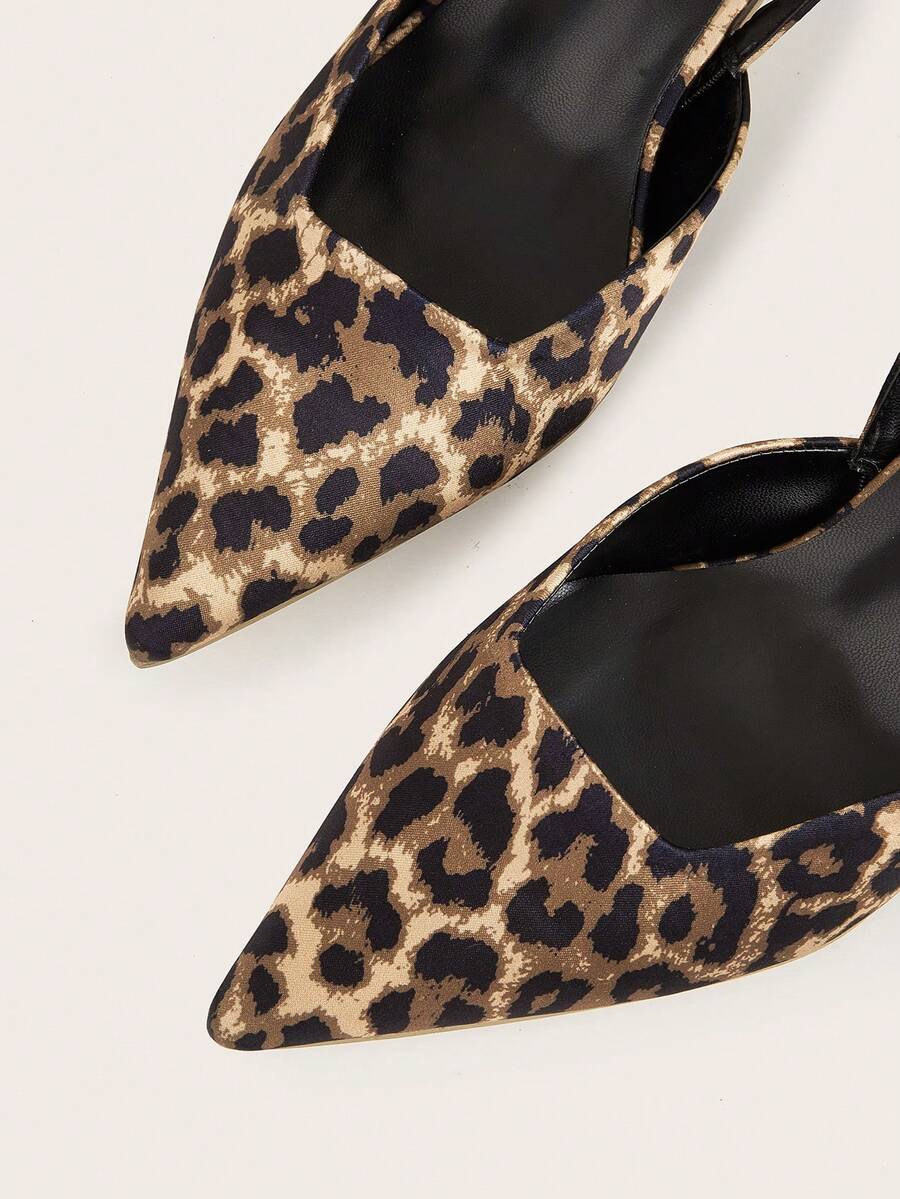 Women's pointed toe kitten heel pumps with leopard print suedette finish and slingback back strap.