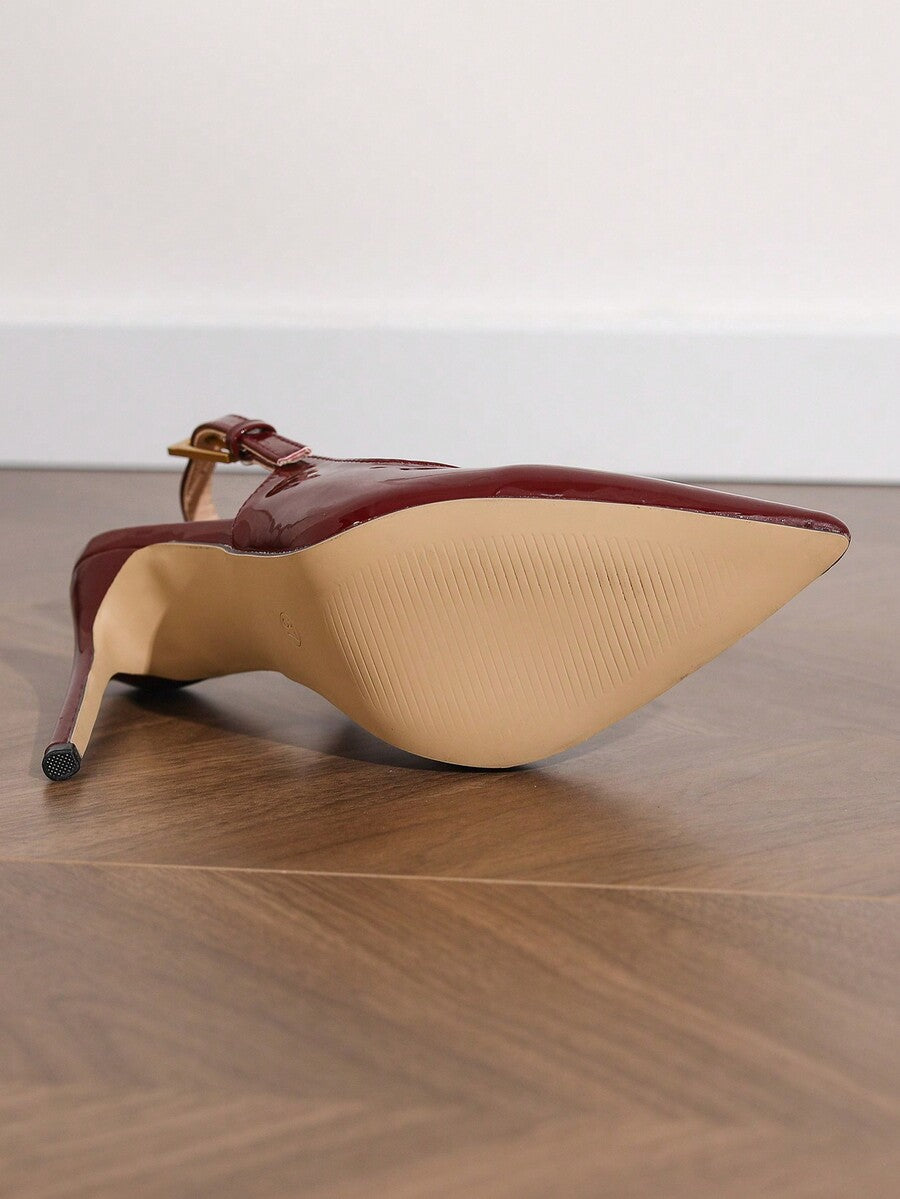 Women's pointed toe stiletto high heel pumps featuring a lace bow accent and slingback buckle strap.