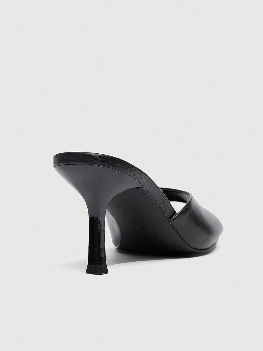 Women's black square toe high heel sandals featuring an open toe design, thin stiletto heel, and slingback strap.