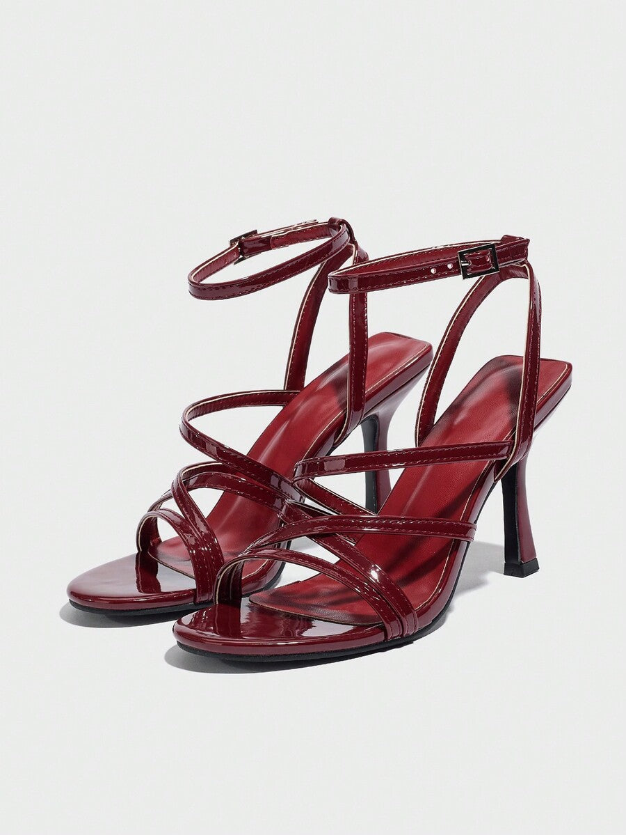 Women's square toe high heel sandals featuring crystal embellishments and crossover ankle straps with buckle closure