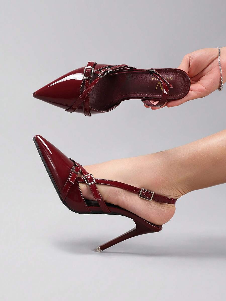 Black lace pointed toe high heel pumps featuring stiletto heels and a decorative bow accent.