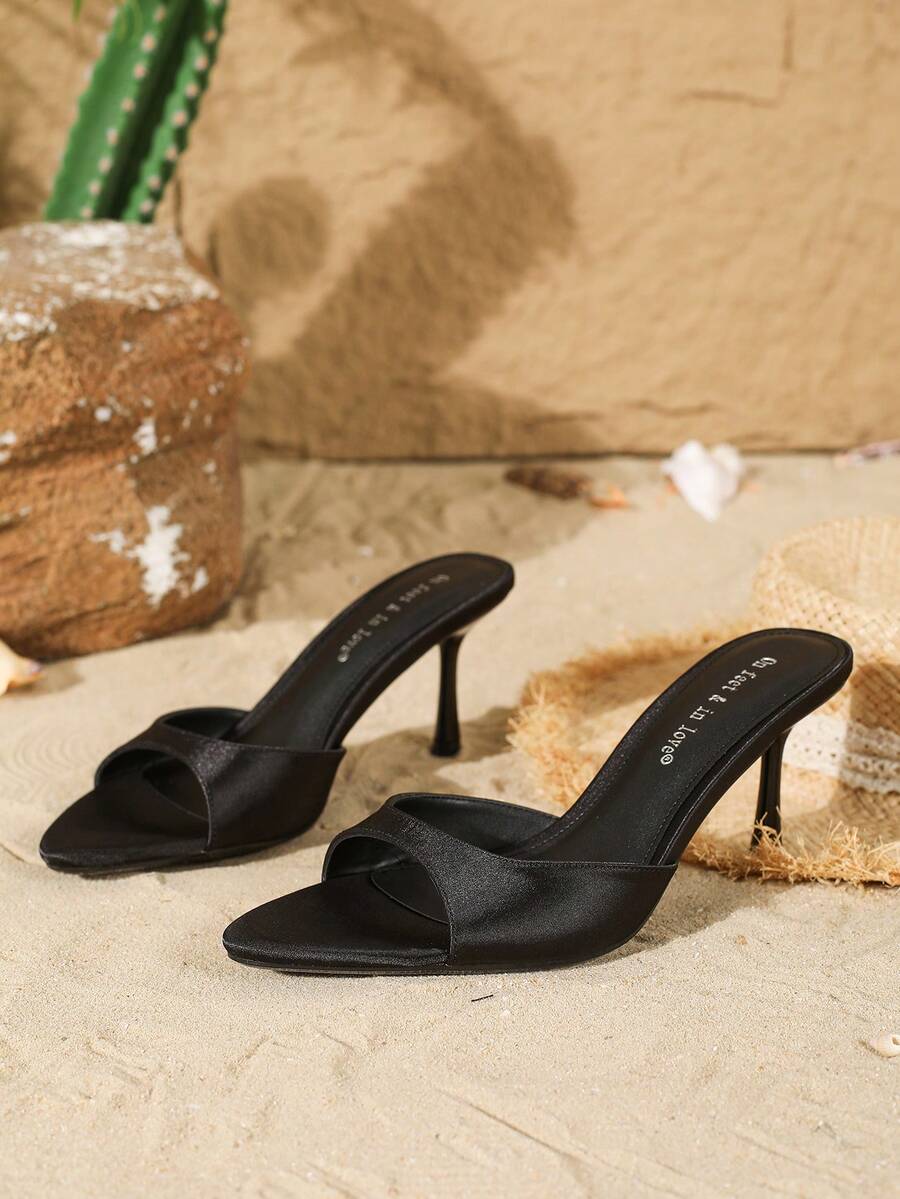 Women's open toe slip-on high heel sandals featuring a smooth satin strap and elegant stiletto mid heel.