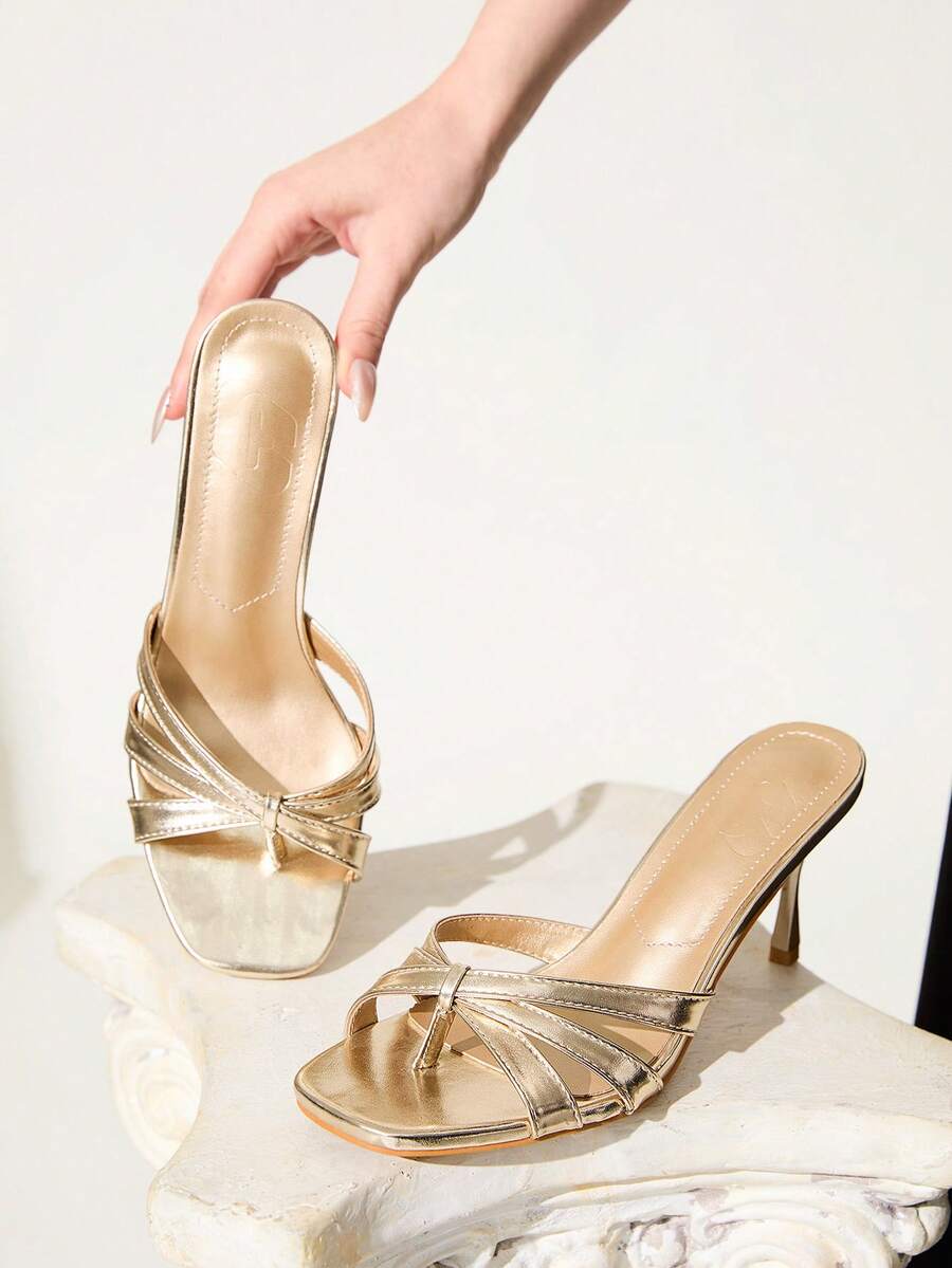 Square toe gold metallic heel sandals for women featuring open toe, crossover slingback strap, and stiletto mid heel for weddings and parties.