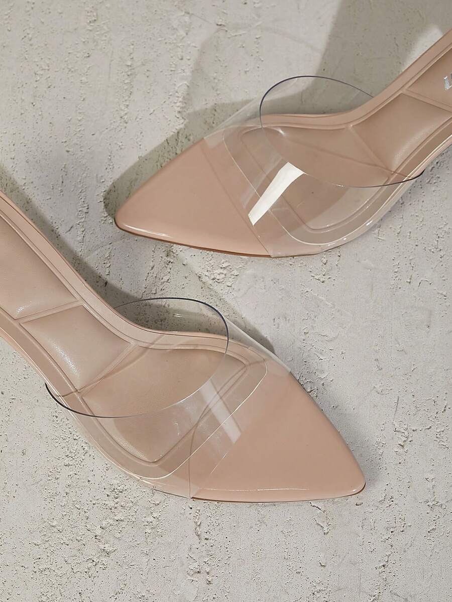 Black pointy toe kitten heel shoes for women featuring a sleek cut out mule design and glossy patent leather finish.