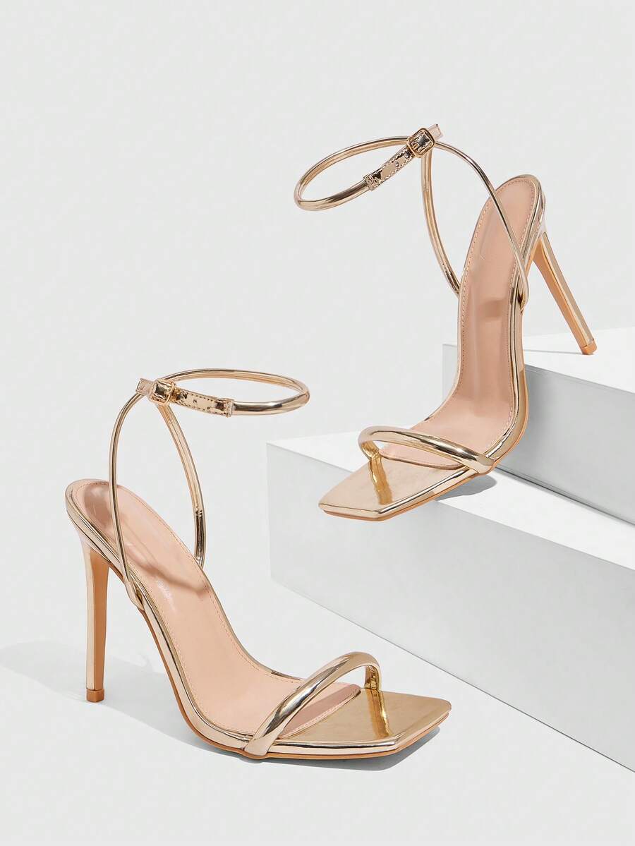 Women's open toe high heel slingback sandals featuring a sleek stiletto heel and adjustable ankle strap buckle closure.