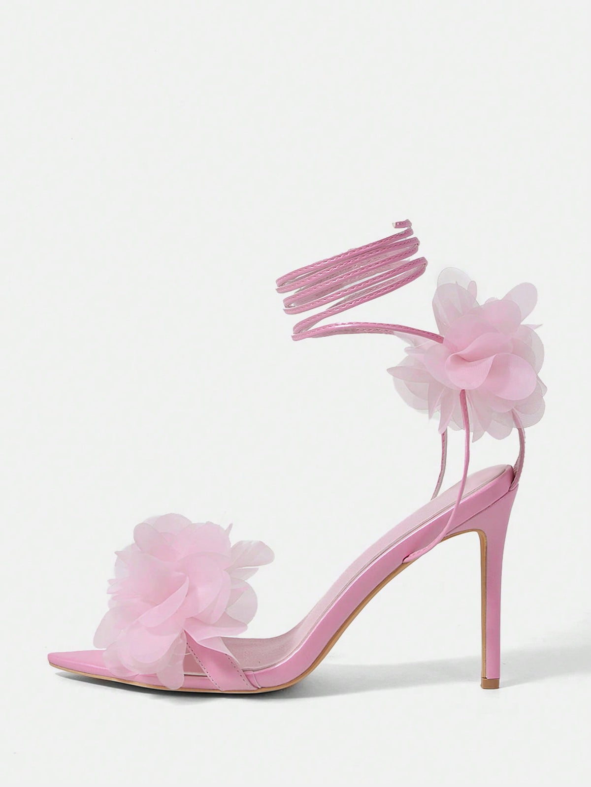 Women's open toe heeled sandals featuring 3D floral decor, satin lace-up ankle straps, and stiletto high heels.