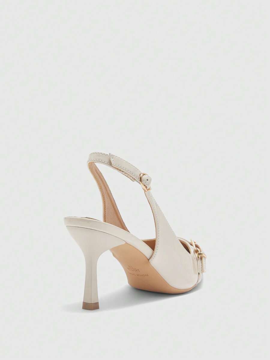 Beige pointed toe high heel pumps featuring a sleek stiletto heel and slingback strap for women.