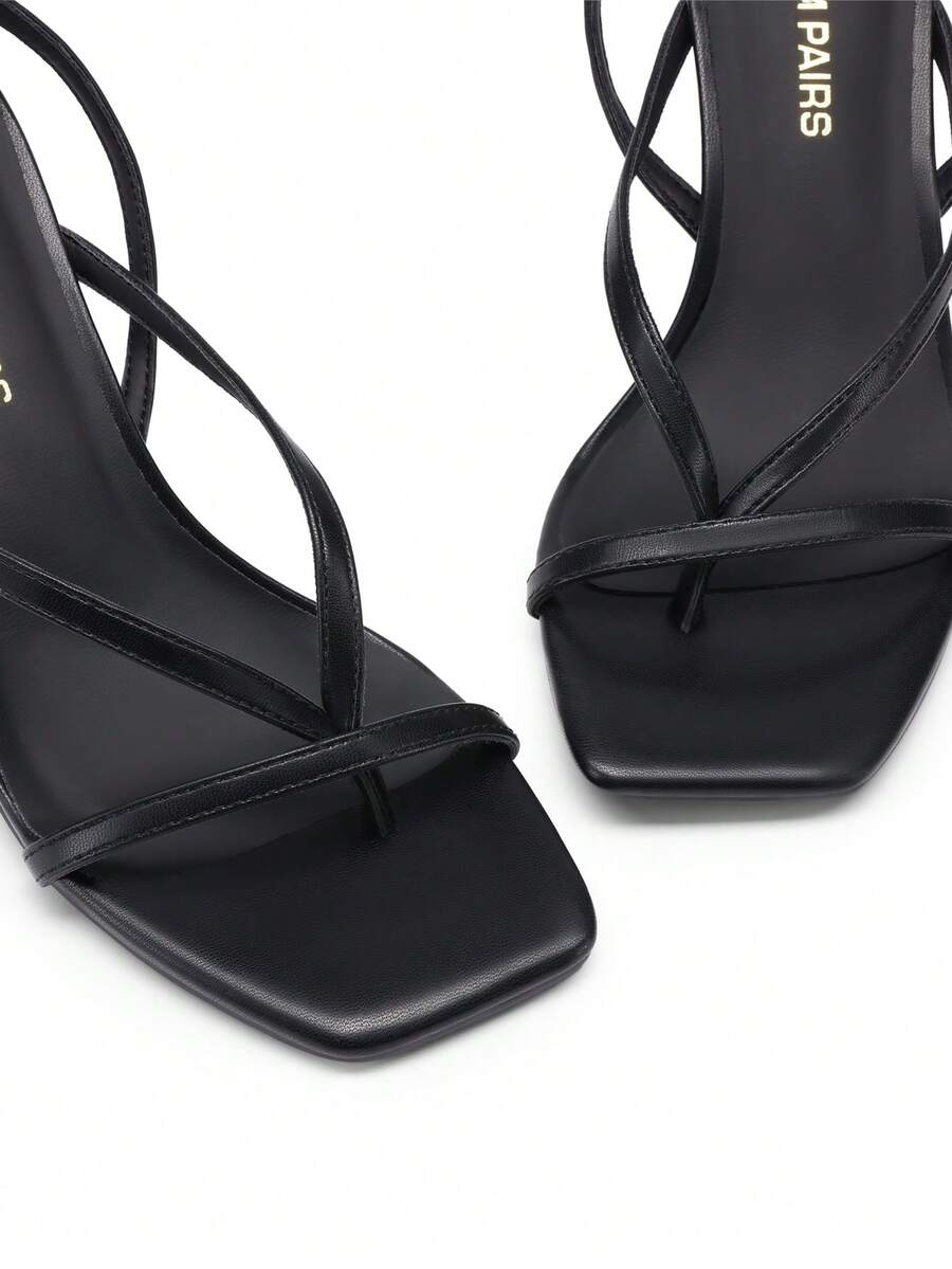 Women's metallic kitten low heel thong sandals featuring an open square toe and slip-on mule design.