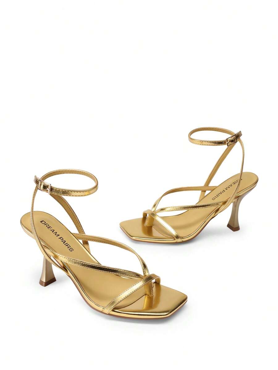 Women's metallic kitten low heel thong sandals featuring an open square toe and slip-on mule design.