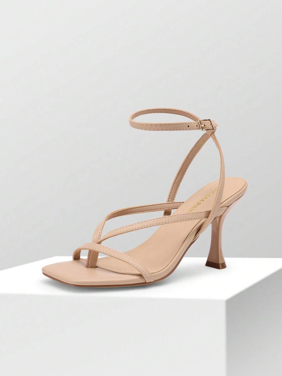 Women's metallic kitten low heel thong sandals featuring an open square toe and slip-on mule design.
