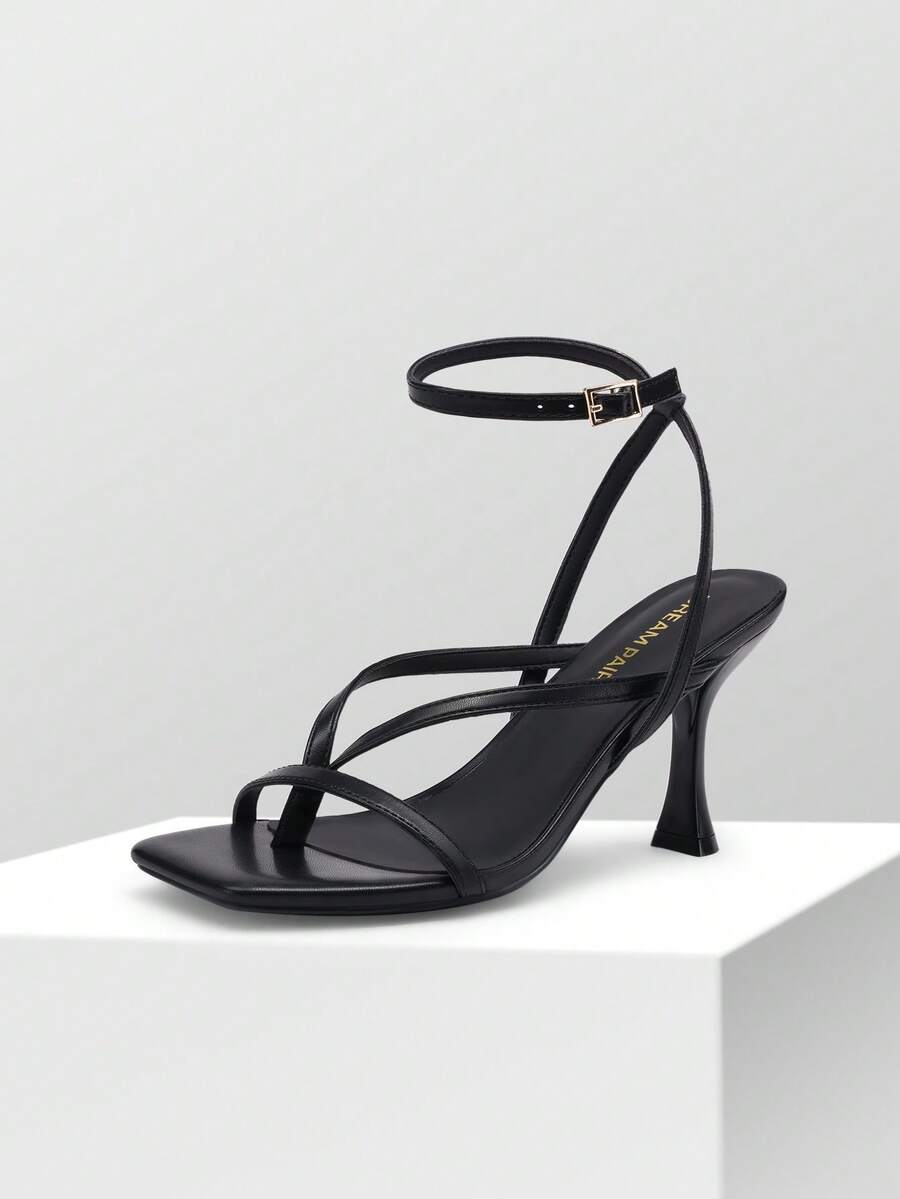 Women's metallic kitten low heel thong sandals featuring an open square toe and slip-on mule design.