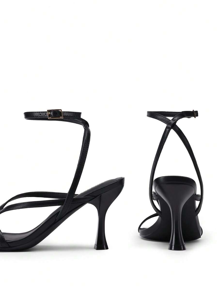Women's metallic kitten low heel thong sandals featuring an open square toe and slip-on mule design.