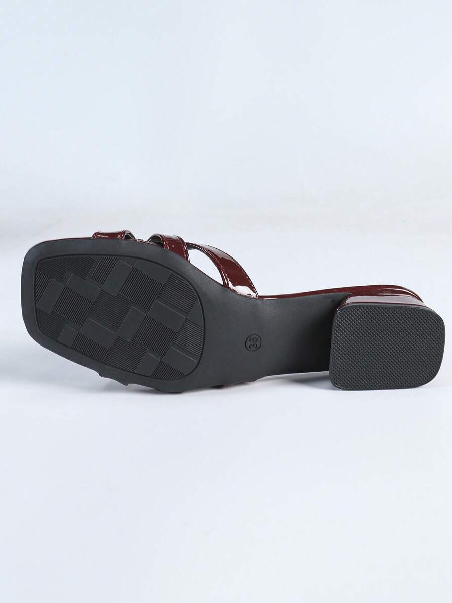 Women's multicolor square toe chunky heel sandals with bohemian textured pattern, canvas upper, and slip-on design.