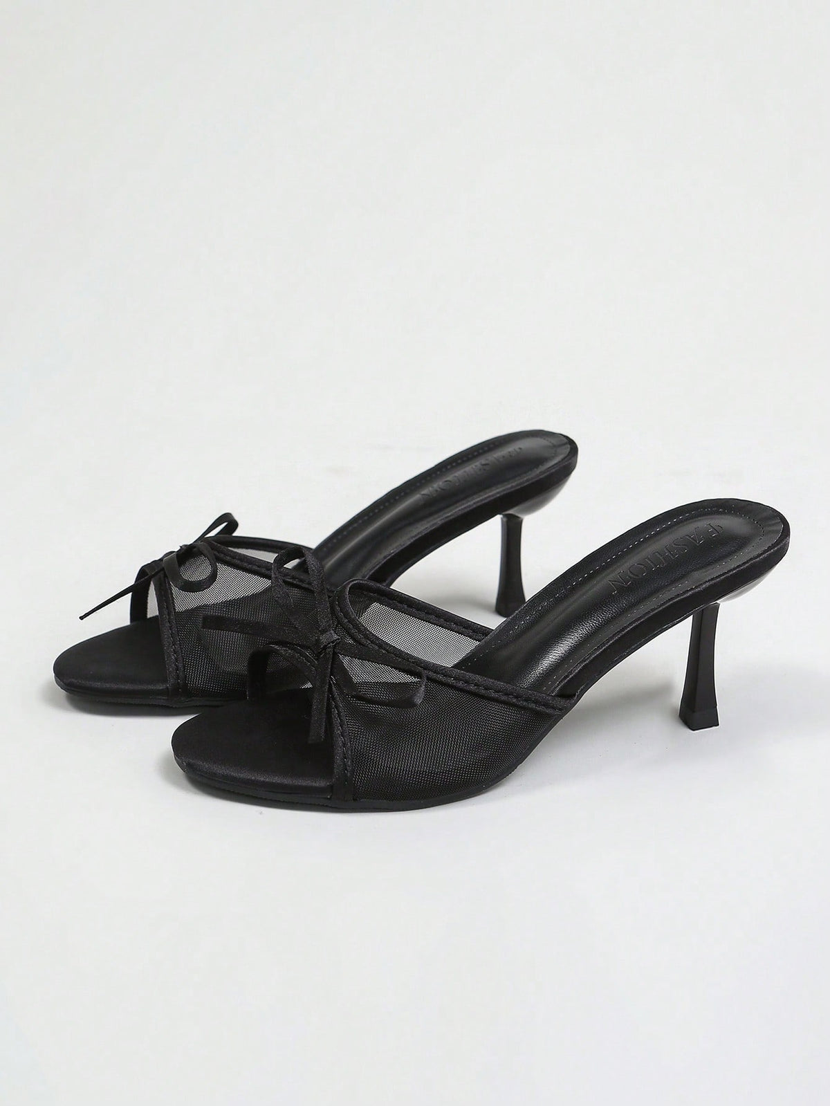 Women's black open toe mesh slide sandals with bowknot detail and stiletto heels