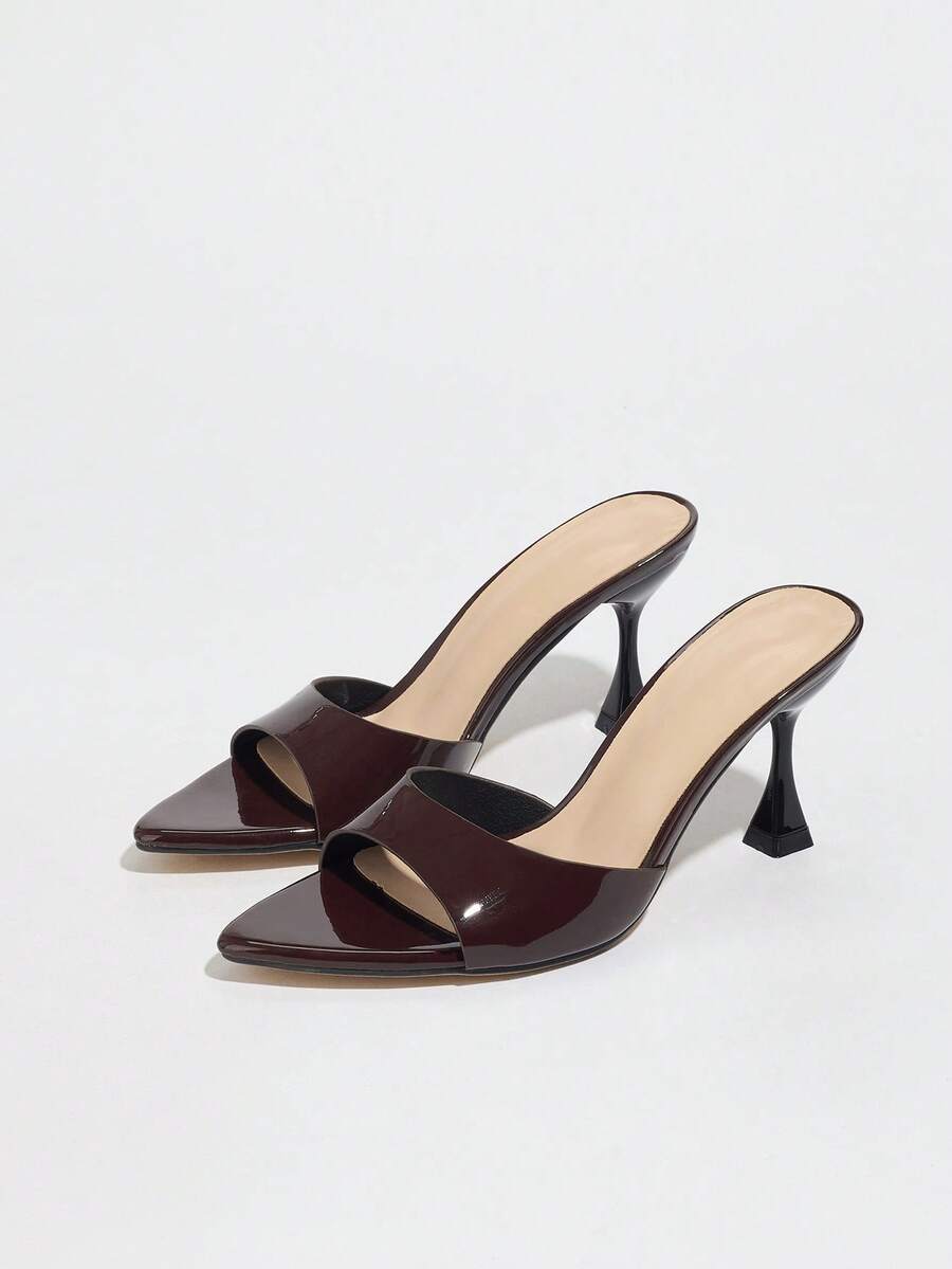 Women's pointed toe high heel mule sandals featuring a sleek slip-on design with elegant lace embroidery detailing