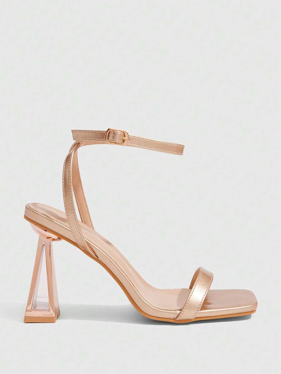 Pair of champagne square toe chunky high heel sandals featuring an open toe design and an adjustable ankle buckle strap.