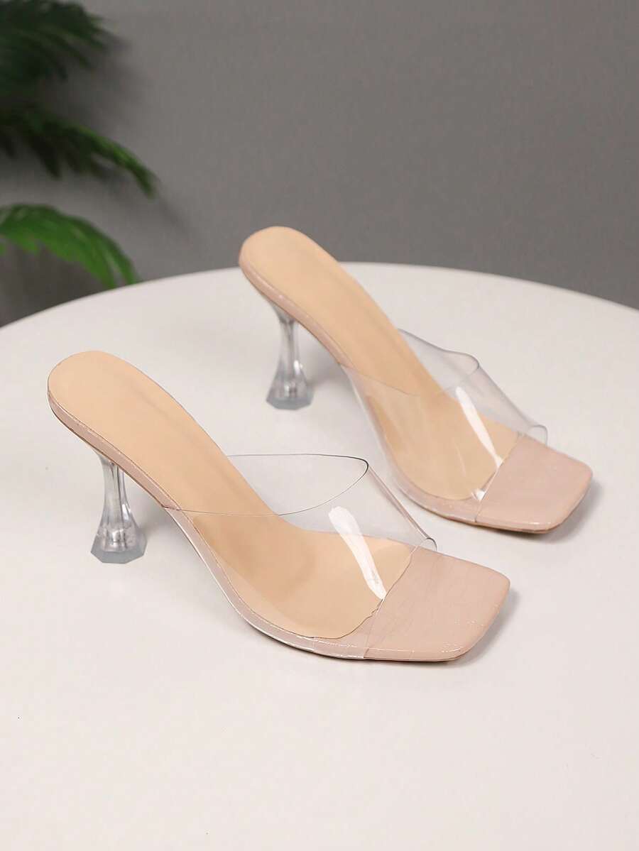Black mirror finish open toe stiletto high heel slide sandals for women featuring crystal and sequin embellishments.