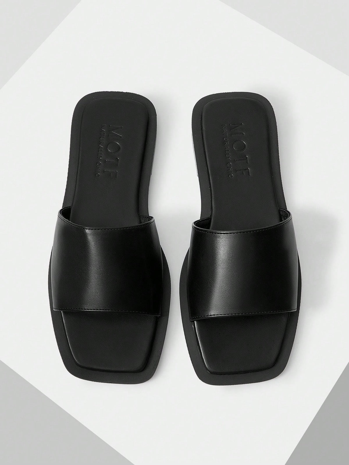 Retro women's square toe open toe flat slippers featuring a smooth PU leather finish and lightweight slip-on design.
