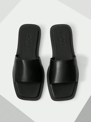 Retro women's square toe open toe flat slippers featuring a smooth PU leather finish and lightweight slip-on design.