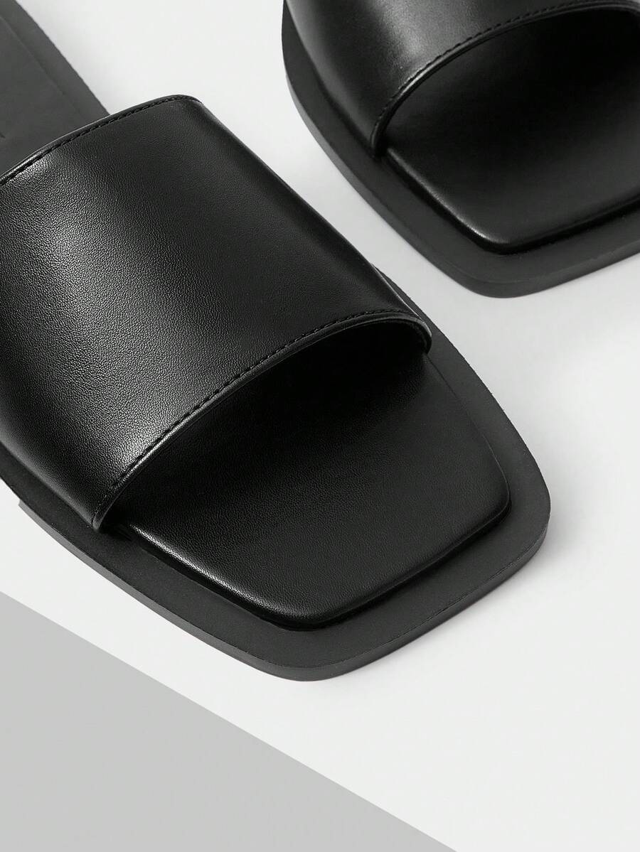 Retro women's square toe open toe flat slippers featuring a smooth PU leather finish and lightweight slip-on design.